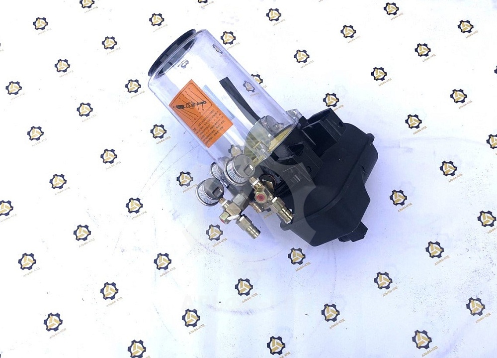 Электромасляный насос смазки для узлов герметизации бетоносмесителей Электромасляный насос смазки для узлов герметизации бетоносмесителей